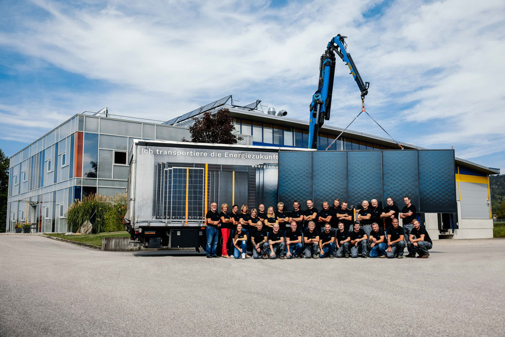 Teamfoto-vor-PKW Teamfoto-vor-PKW